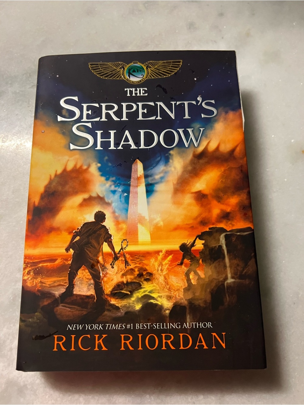 The Serpent's Shadow - Orange and Blue Paperback Book